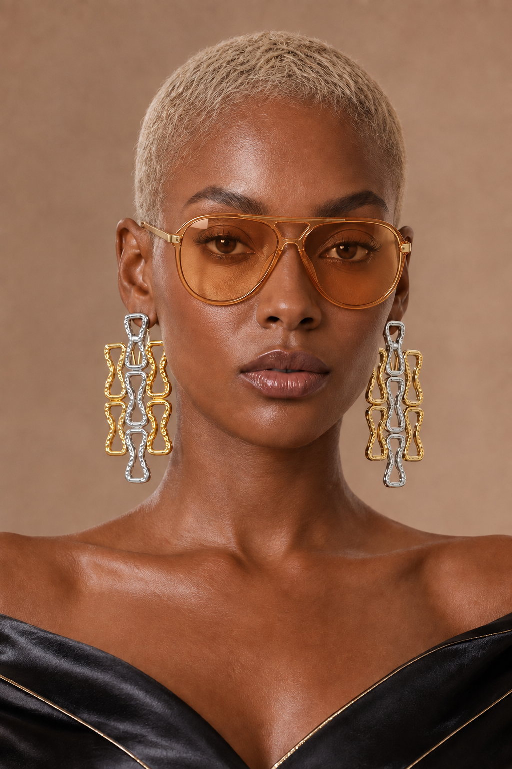 Amara oversized aviator shades in Amber Orange worn by a BLANC LOVE model