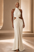 Black female model wearing the Infinity Knot Halter Gown, front view