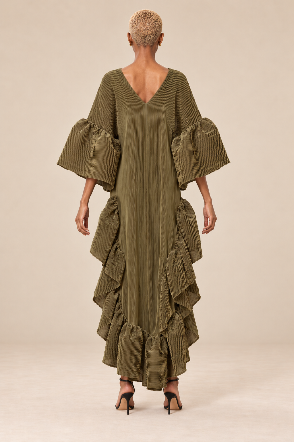 Olive Cascade Pleated High-Low Ruffle Dress on BLANC LOVE main model, back view