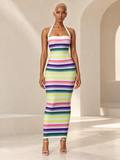 BLANC LOVE model wearing the multicolor Prism Ombré Stripe Halter Maxi Dress, front view