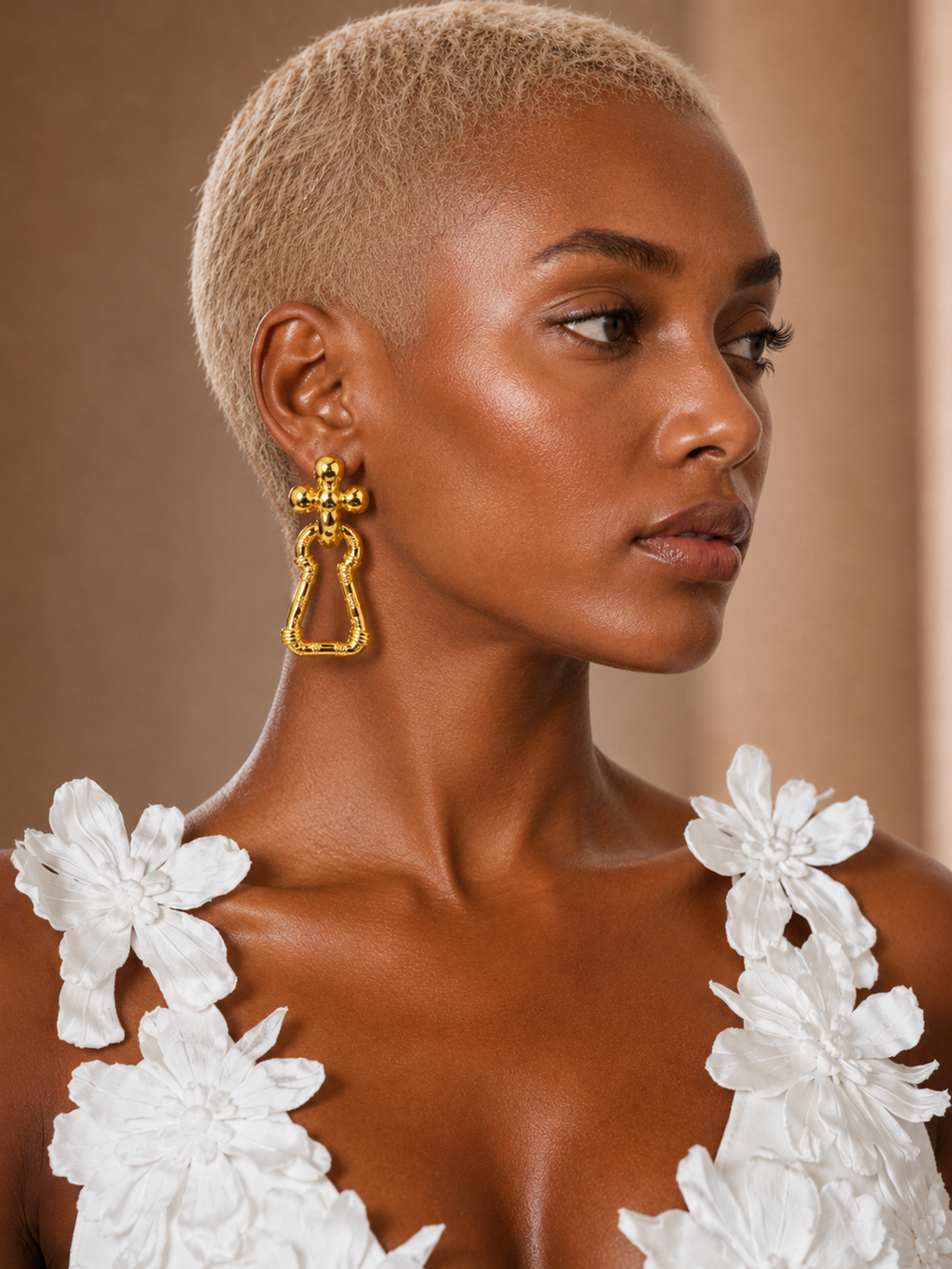 BLANC LOVE Sculpted Gold drop earrings profile view
