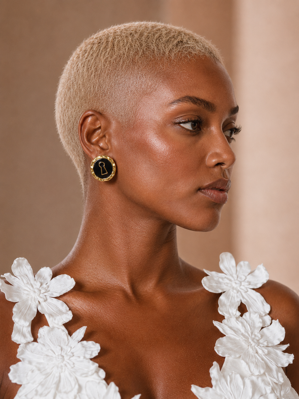 BLANC LOVE Secret Key statement stud earrings profile view