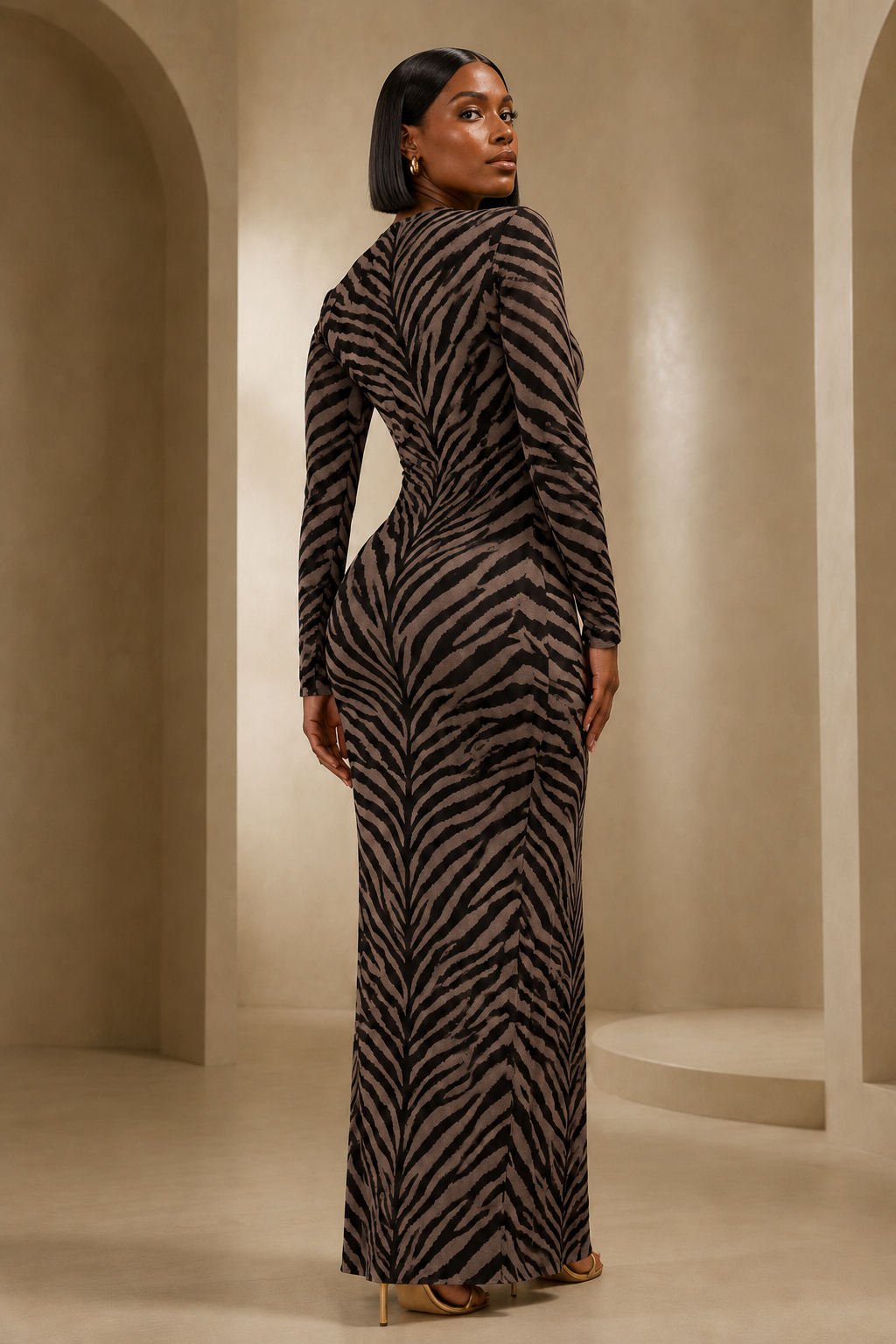 Untamed Elegance zebra print maxi dress back view with sleek black bob