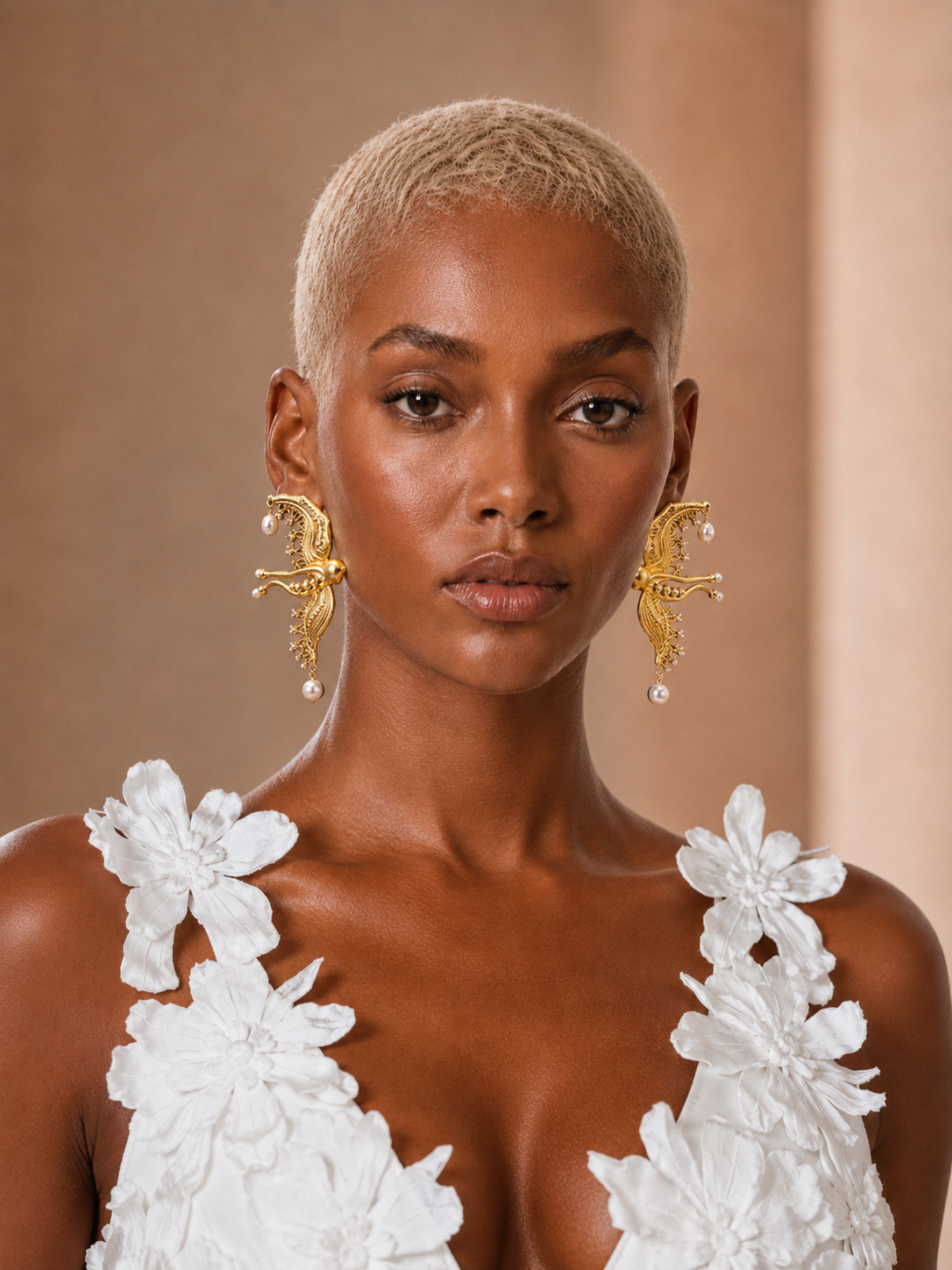 BLANC LOVE Winged Pearl statement earrings front view